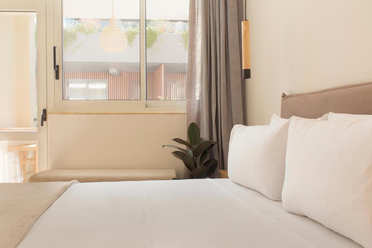 Living Stone Condo Hotel Athena Bagian luar foto