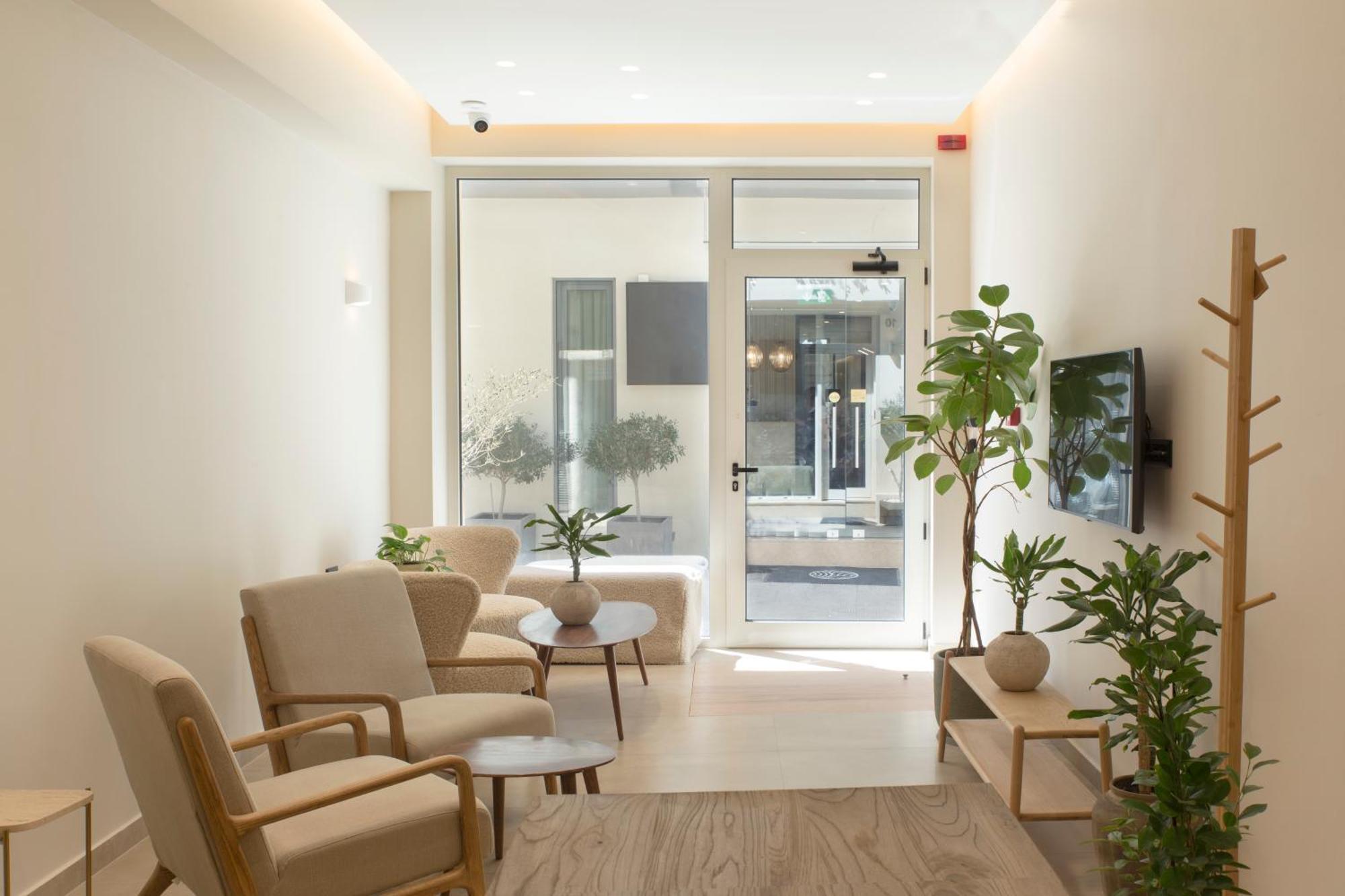Living Stone Condo Hotel Athena Bagian luar foto